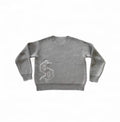 "DOLLAR" KNIT SWEATER